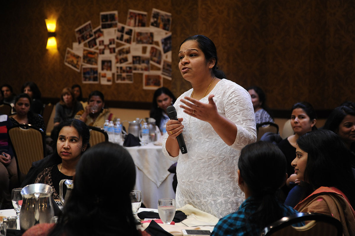 Woman speaks at a community event