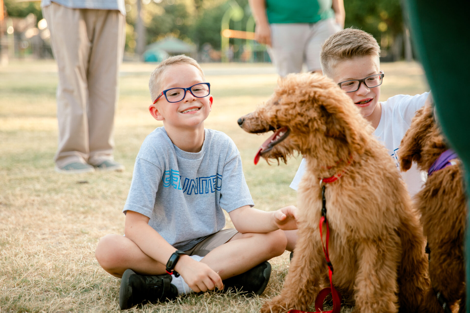 boy petting dog