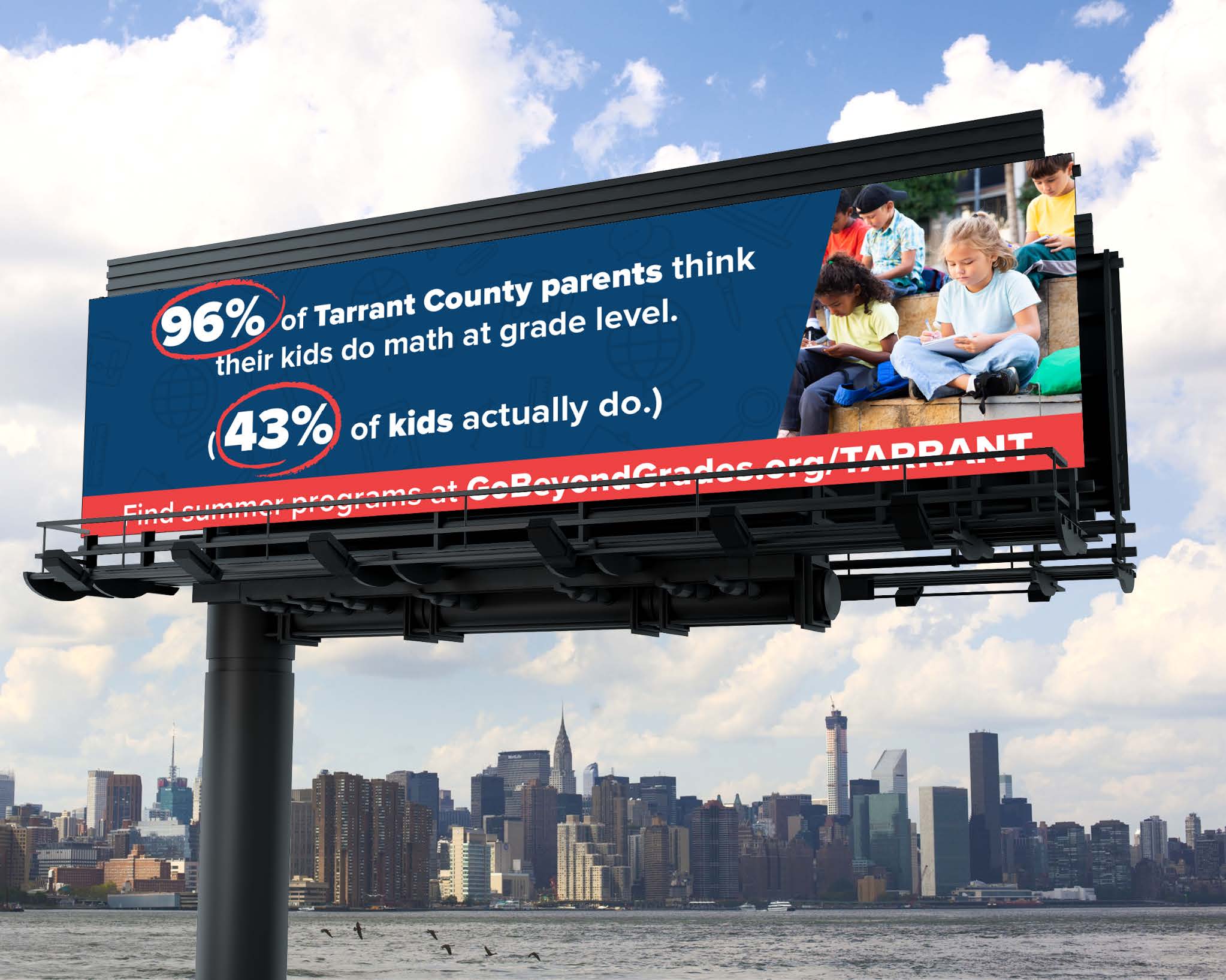 Billboard with city skyline in the background. The text on the billboard reads: "96% of Tarrant County parents think their kids do math at grade level. 43% of kids actually do." Billboard features children sitting in a classroom.