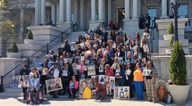Group of mothers who've been affected by gun violence from across the United States gather for a photo outside of the White House.