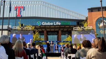 group of people in front of stadium