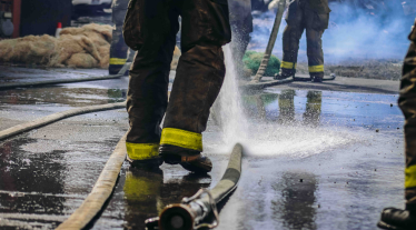 Fire Fighter spraying water