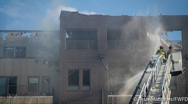 Firefighters putting out fire at The Cooper apartments in Fort Worth. Photo by Peter Matthews, Fort Worth Fire Department